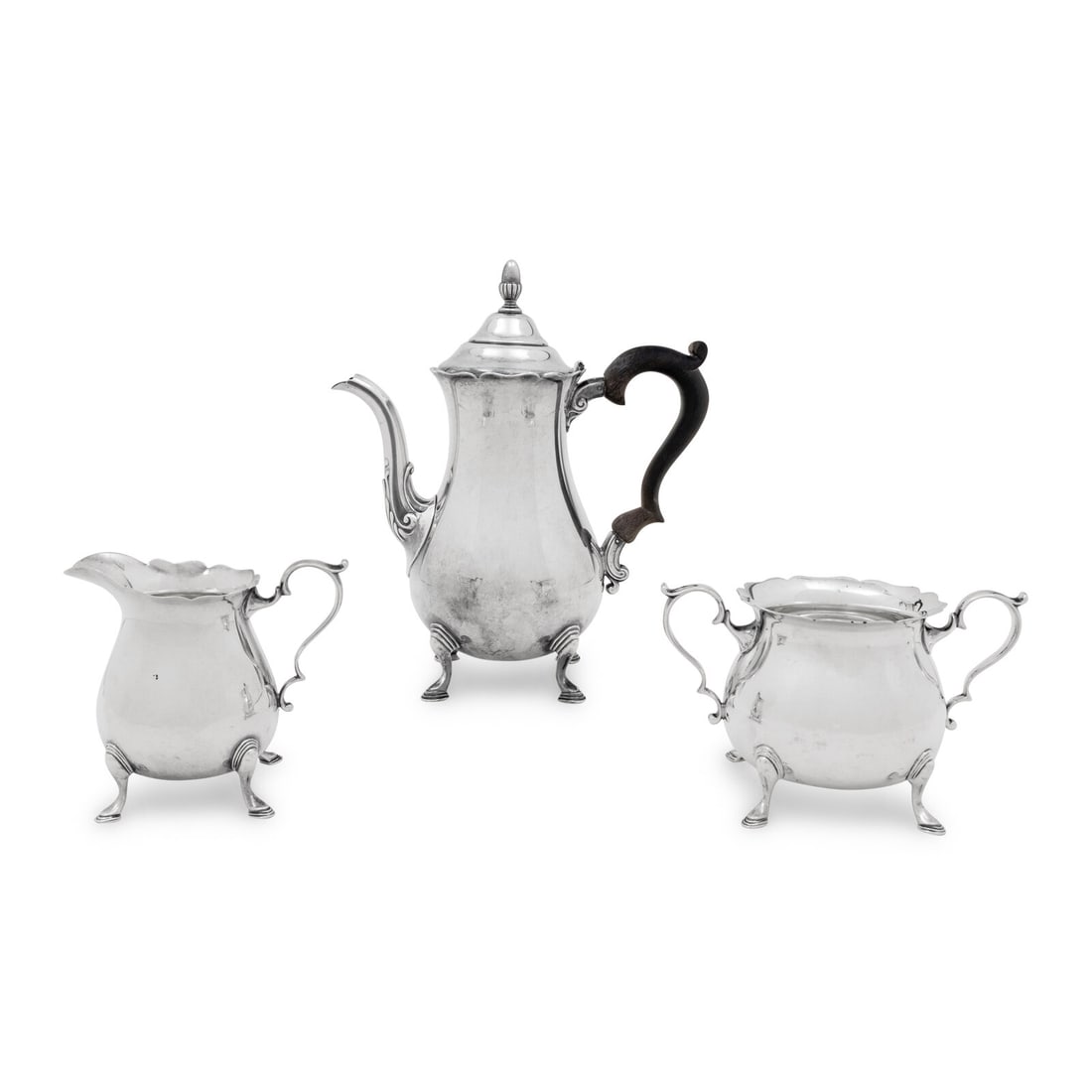 An American Silver Three-Piece Coffee Service: An American Silver Three-Piece Coffee Service J. Wagner and Son, New York, 20th Century comprising a coffee pot, creamer, and open sugar. each stamped for Sterling to underside 48 ozt 9 dwt gross
