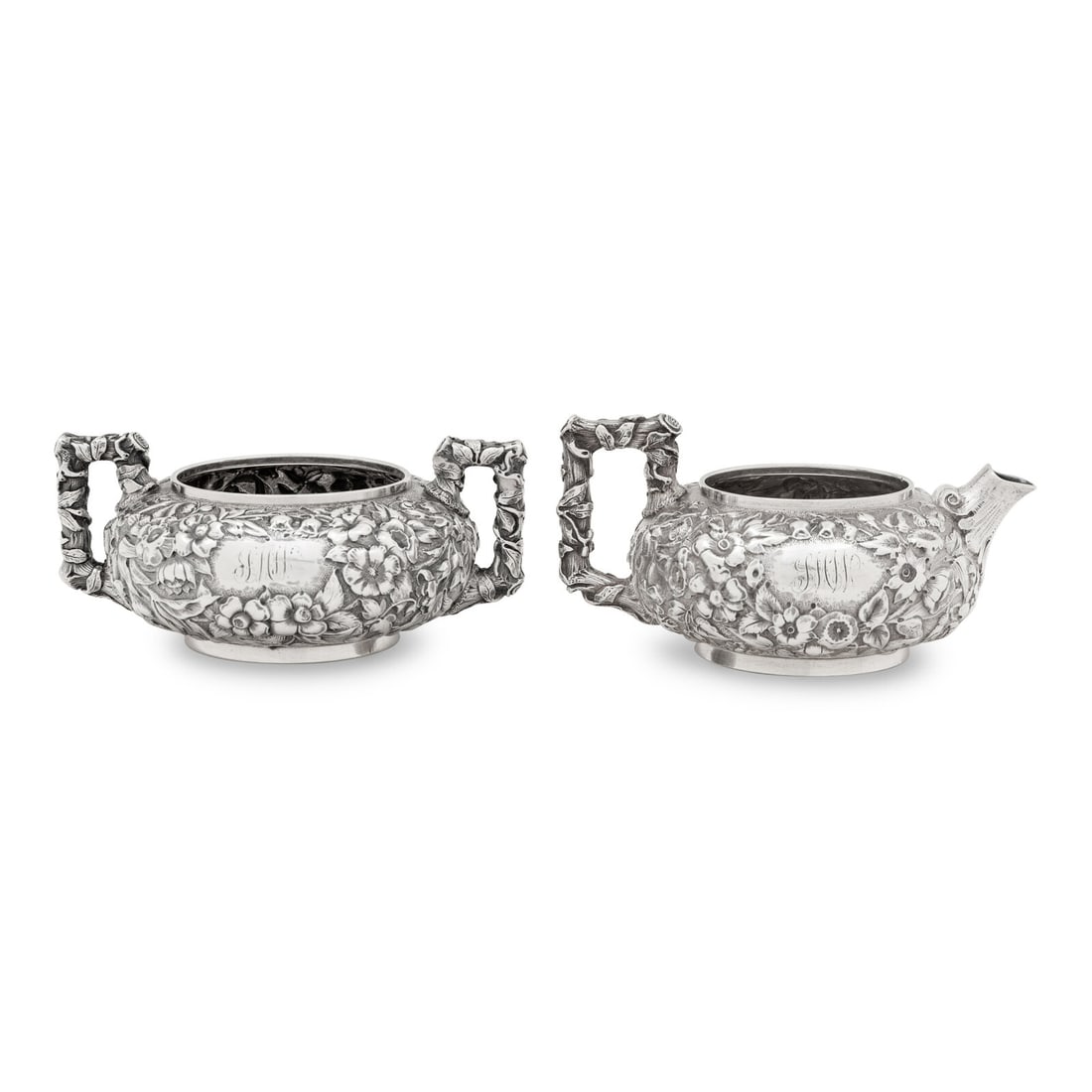 An American Silver Cream and Sugar Set: An American Silver Cream and Sugar Set Dominick and Haff, New York, 20th Century each marked 'Sterling' to underside 15 ozt gross Height of creamer 2 3/4 inches. This lot is located in Chicago.
