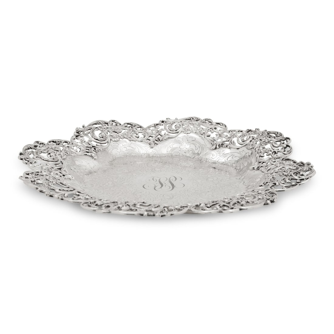An American Silver Center Bowl: An American Silver Center Bowl Roger Williams Silver Co., Providence, RI, Early 20th Century retailed by Loring, Andrews and Co. marked 'Sterling' to underside 32 ozt 15 dwt Diameter 14 1/4 inches.