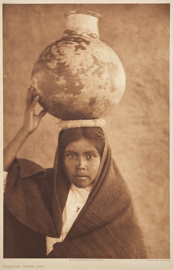 Edward Curtis (American, 1868-1952) Qahatika Water Girl, 1907: Edward Curtis (American, 1868-1952) Qahatika Water Girl, 1907 plate 54 on Japanese Gampi tissue mounted to larger sheet, in mat. 17-1/2 x 11-3/8 inches (444 x 289 mm) This lot is located in