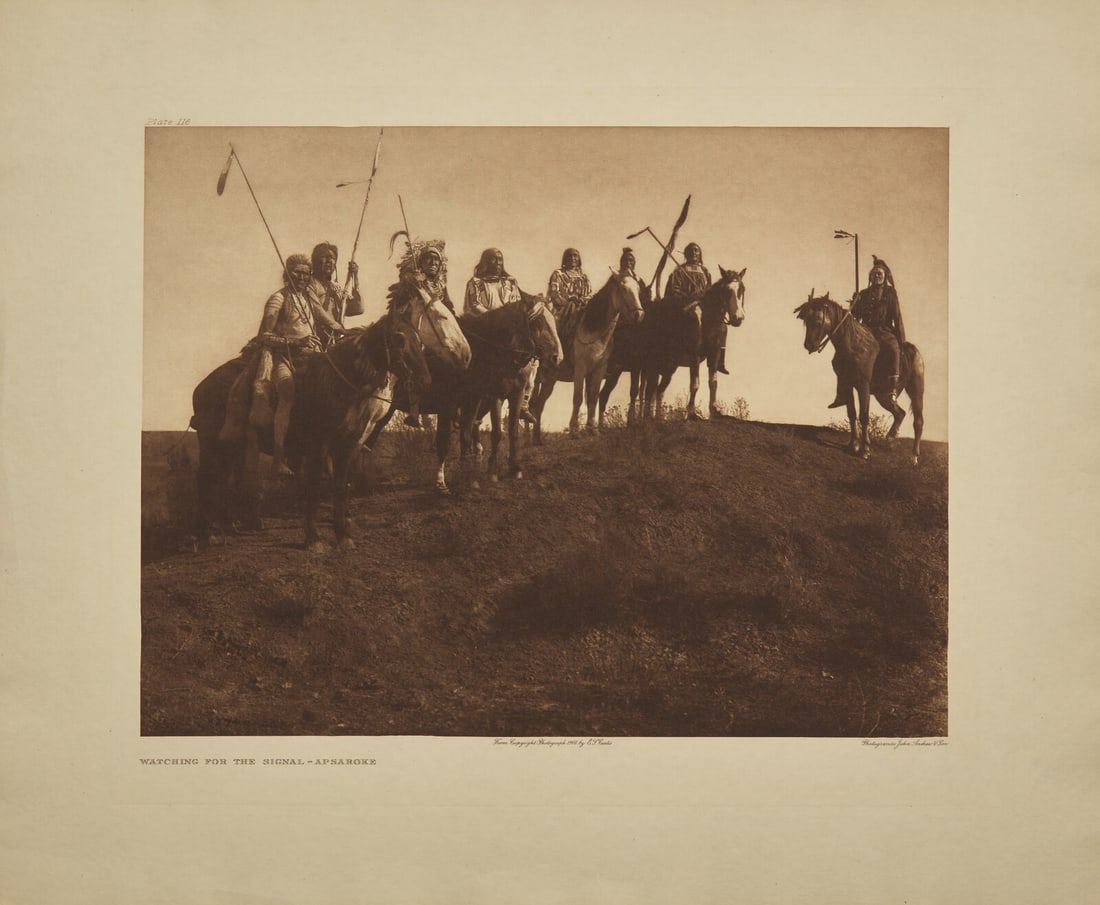 Edward Curtis (American, 1868-1952) Watching for the Signal - Apsaroke, 1908: Edward Curtis (American, 1868-1952) Watching for the Signal - Apsaroke, 1908 plate 116 on Japon vellum 18 x 22 inches (457 x 559 mm) This lot is located in Philadelphia.