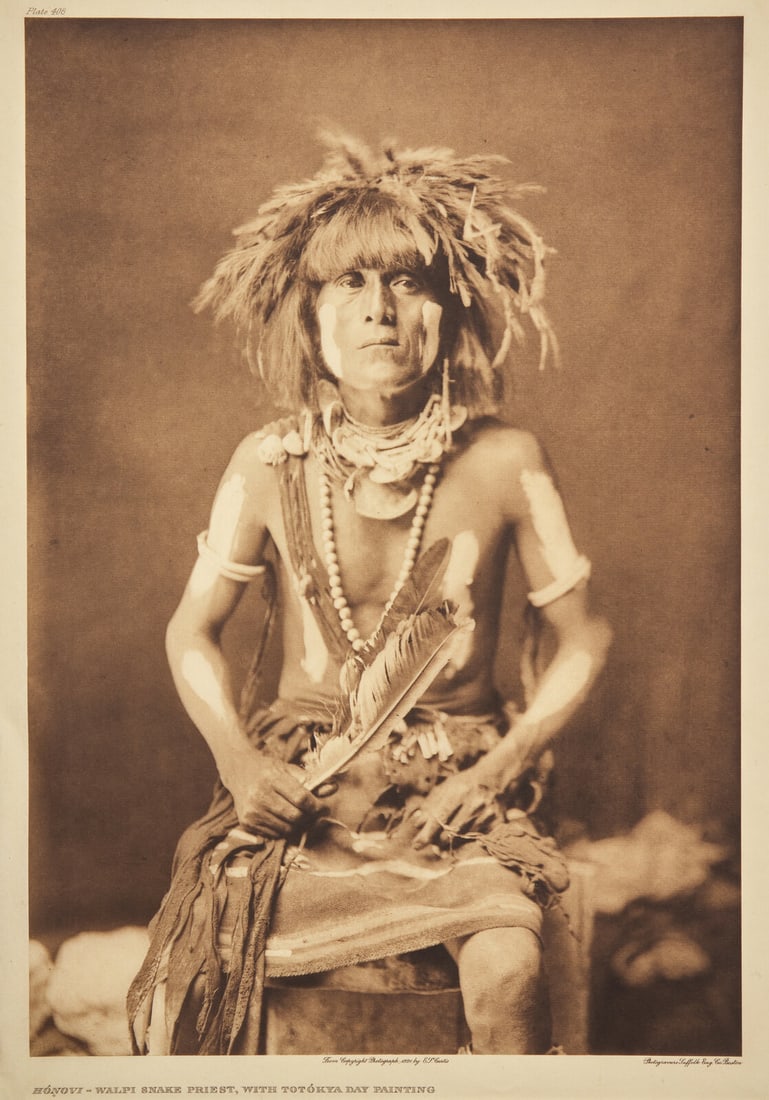 Edward Curtis (American, 1868-1952) Honovi -Walpi Snake Priest, with Totokya Day Painting, 1921: Edward Curtis (American, 1868-1952) Honovi -Walpi Snake Priest, with Totokya Day Painting, 1921 plate 408 on Japanese Gampi tissue mounted to larger sheet, in mat. 17-3/8 x 11-7/8 inches (441 x 302