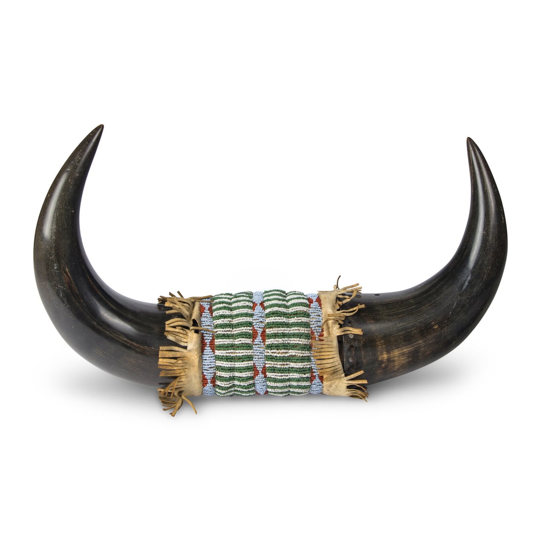 Sioux Beaded Horns: Sioux Beaded Horns early 20th century sinew-sewn, with central beaded hide panel overall length 17-1/2 inches x height 10 inches Laura Nuckolls Collection, Texas This lot is located in Chicago.