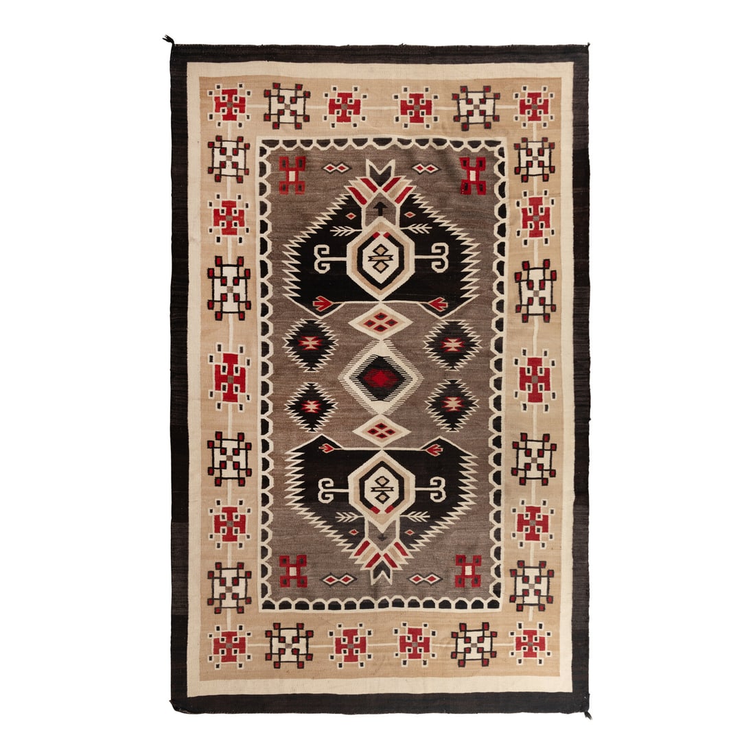 Navajo Bisti Roomsize Weaving [Rug]: Navajo Bisti Roomsize Weaving [Rug] second quarter 20th century flat, handspun wool woven in tans, black, and red; having a Spiderwoman cross border, serrated diamonds, and central curled elements 102