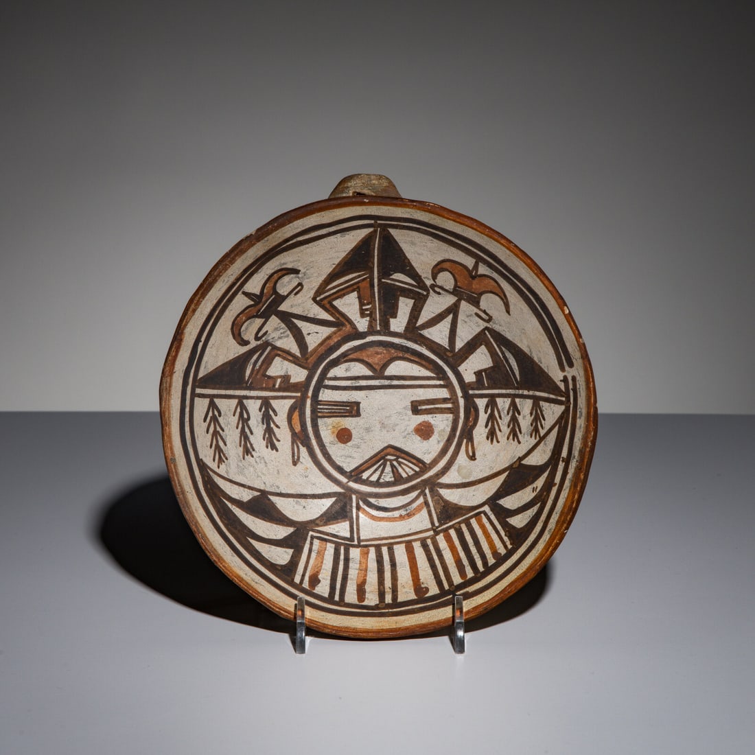 Nampeyo of Hano, Attributed (Hopi, 1859-1942) Polychrome Bowl, Pahlik Mana: Nampeyo of Hano, Attributed (Hopi, 1859-1942) Polychrome Bowl, Pahlik Mana graphically painted and with a lug handle on top height 1-3/4 inches x diameter 7-1/4 inches This lot is located in Chicago. 