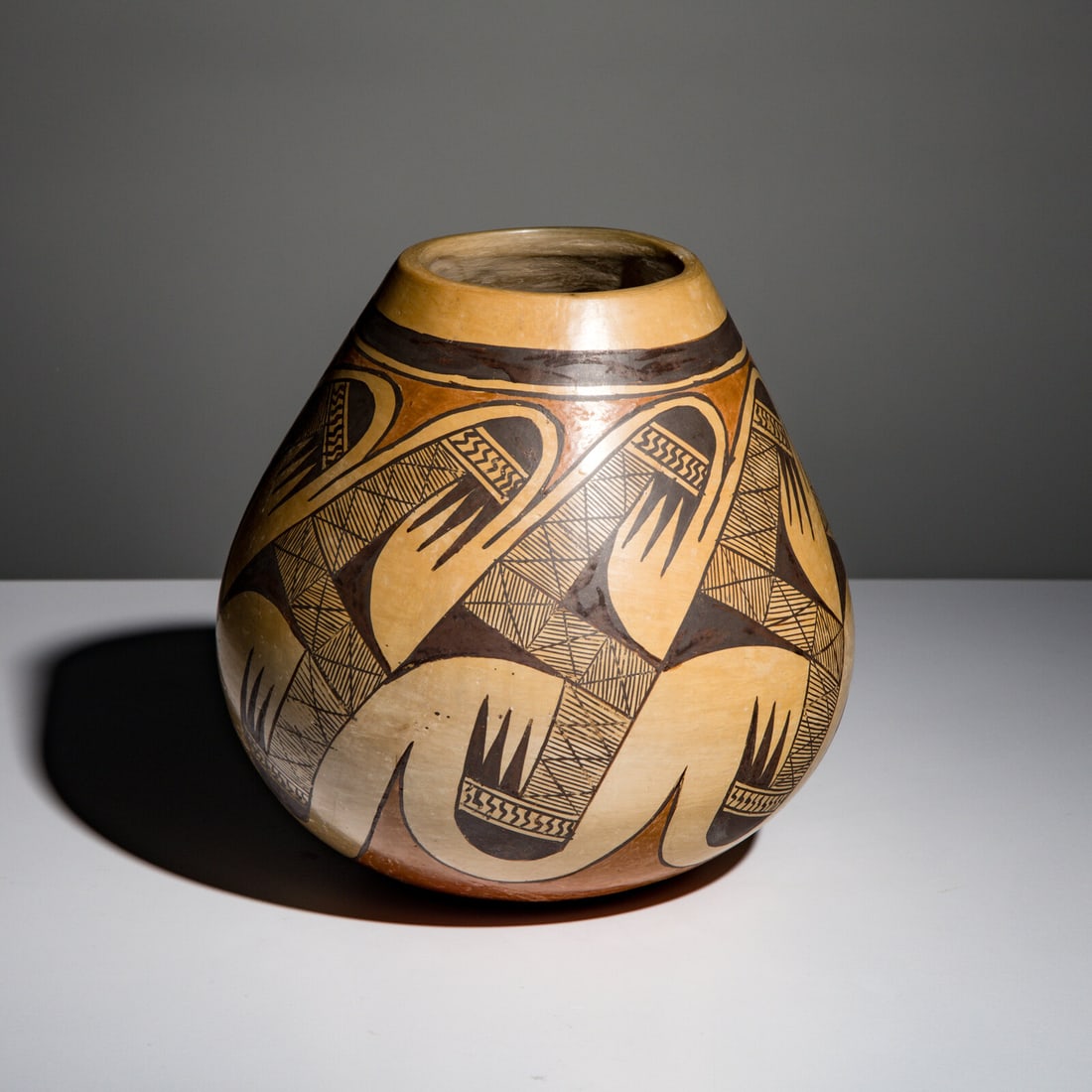 Daisy Hooee Nampeyo (Hopi-Tewa, 1906-1994) Polychrome Pottery Jar, Migration Pattern: Daisy Hooee Nampeyo (Hopi-Tewa, 1906-1994) Polychrome Pottery Jar, Migration Pattern signed on base height 6-1/4 inches x diameter 6-1/2 inches This lot is located in Chicago.