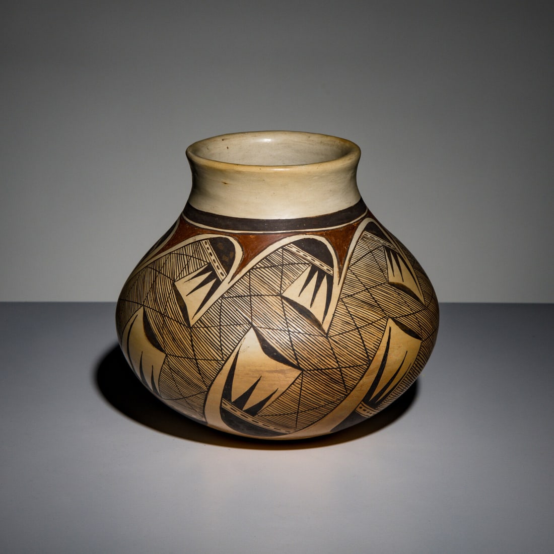 Priscilla Namingha (Hopi-Tewa, b. 1924-2008) Polychrome Pottery Jar, with Migration Pattern: Priscilla Namingha (Hopi-Tewa, b. 1924-2008) Polychrome Pottery Jar, with Migration Pattern signed on base height 5-1/2 inches x diameter 6 inches This lot is located in Chicago.