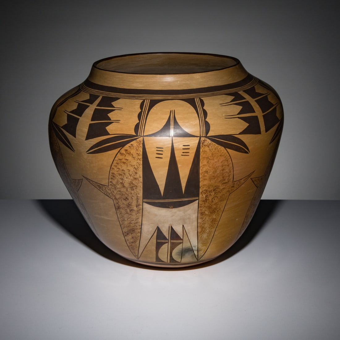 Rachel Sahmie Nampeyo (Hopi-Tewa, 1956-2022) Monumental Polychrome Pottery Jar: Rachel Sahmie Nampeyo (Hopi-Tewa, 1956-2022) Monumental Polychrome Pottery Jar large form and painted with eagle tail elements; signed on base height 13 inches x diameter 14 inches This lot is located