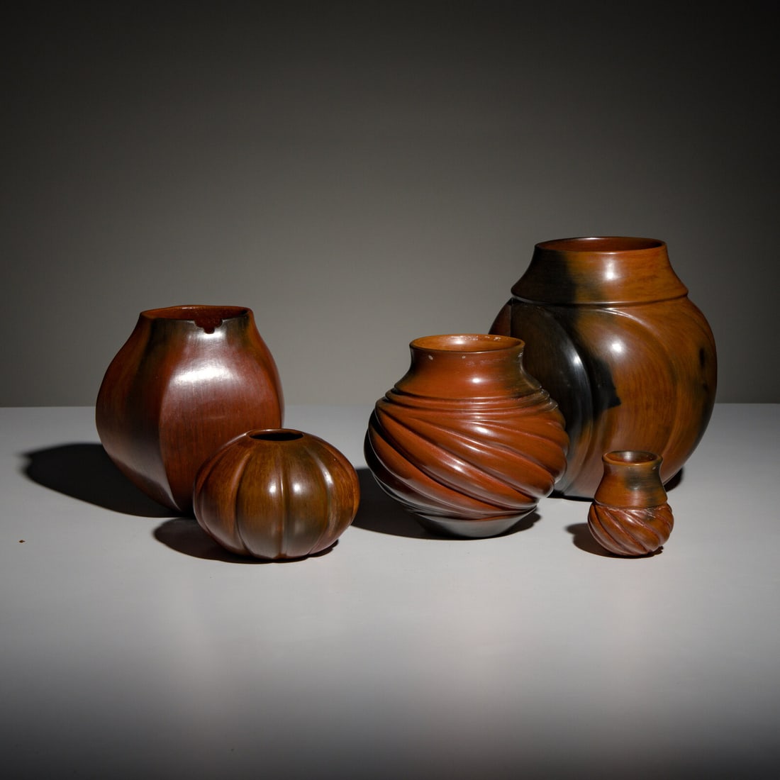 Samuel Manymules (DinÈ, b. 1963) Pottery Jars: Samuel Manymules (DinÈ, b. 1963) Pottery Jars lot of 5 sculptural jars; all signed on base, includes: a five-sided jar with serrated cutout near rim; height 6 inches x diameter 5-3/4 inches a min