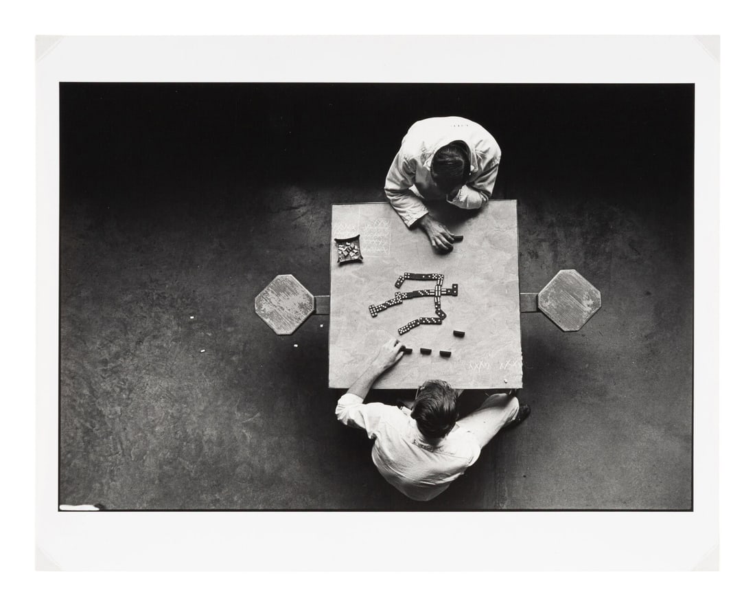 Danny Lyon (American, b. 1942) Midway Texas (prisoners and dominoes), 1968: Danny Lyon (American, b. 1942) Midway Texas (prisoners and dominoes), 1968 gelatin silver print signed in pencil, verso 8 5/8 x 12 7/8 in. Property from the Museum of Fine Arts, Houston This lot is lo