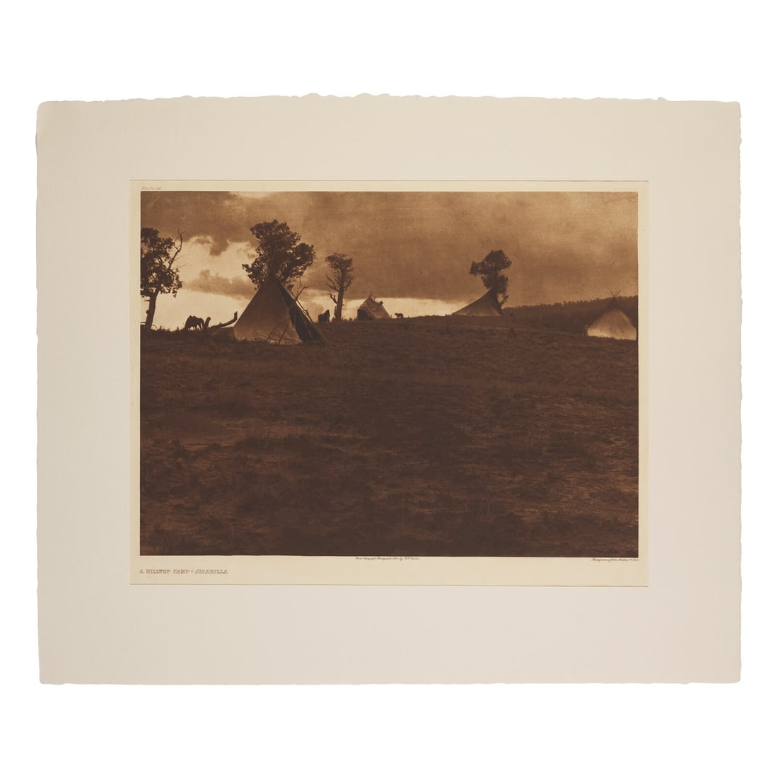 Edward Curtis (American, 1868-1952) A Hilltop Camp - JicarillaPlate 24: Edward Curtis (American, 1868-1952) A Hilltop Camp - JicarillaPlate 24 photogravure John Andrew & Son, 1904. Japanese Gampi tissue. Mounted to larger sheet, in mat. 13 1/4 x 17 in. (336 x 432 mm).