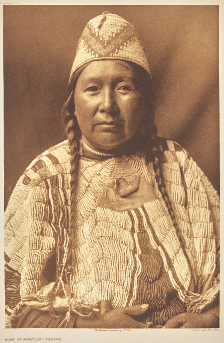Edward Curtis (American, 1868-1952) Wife of Mnainak - Yakima Plate 221: Edward Curtis (American, 1868-1952) Wife of Mnainak - Yakima Plate 221 photogravure John Andrew & Son, 1910. Japanese Gampi tissue. Mounted to larger sheet, in mat. 17 1/2 x 11 1/2 in. (444 x 292 
