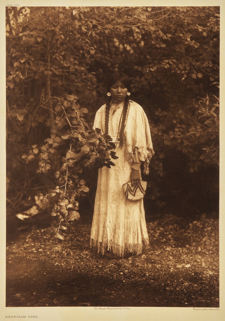 Edward Curtis (American, 1868-1952) Nespilim GirlPlate 246: Edward Curtis (American, 1868-1952) Nespilim GirlPlate 246 photogravure John Andrew & Son, 1905. Japanese Gampi tissue. Mounted to larger sheet, in mat. 17 1/2 x 12 1/2 in. (444 x 317 mm). This lo