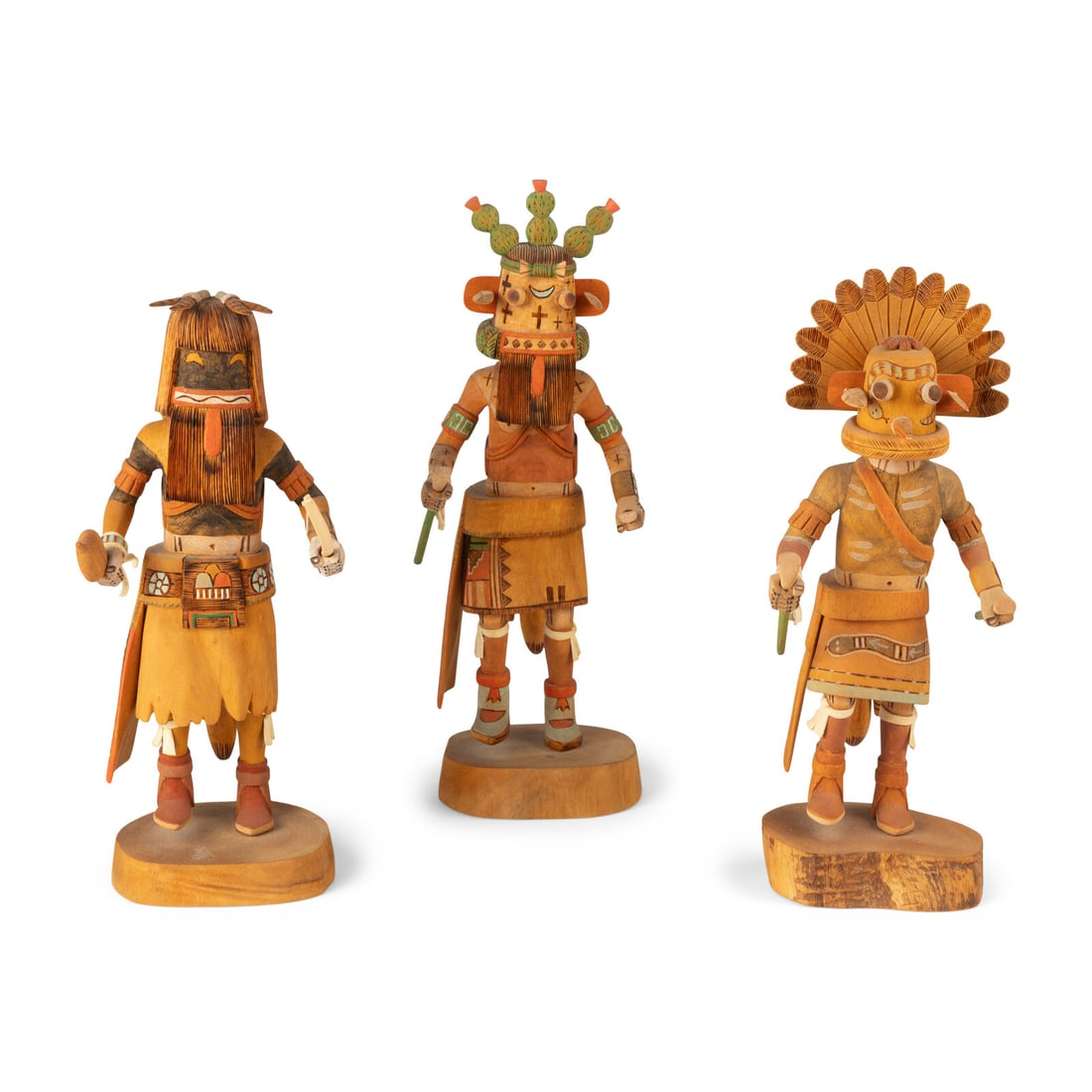 Oscar Dallas (Hopi, b. ca 1930) Collection of Katsinas: Oscar Dallas (Hopi, b. ca 1930) Collection of Katsinas lot of 3, all titled and signed, includes: Heoto, height 11-1/2 inches Prickly Pear, height 13 inches Situlili, height 12 inches R. Thomas Snyder