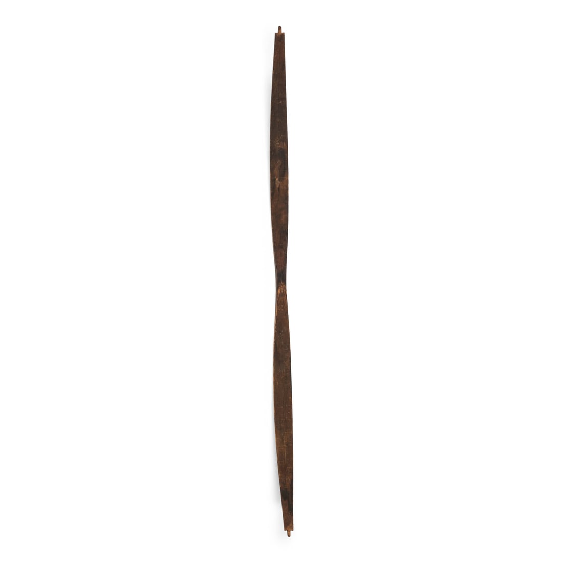 Native Alaskan Wood Bow: Native Alaskan Wood Bow late 19th century with notched ends; soft hourglass form with a raised central rib length 49 inches The Ronny and Doris Smithee Collection, Oklahoma City This lot is located in