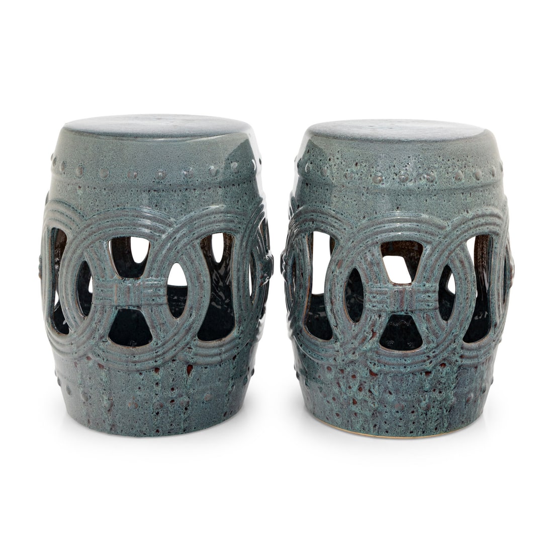 A Pair of Glazed Earthenware Garden Seats: A Pair of Glazed Earthenware Garden Seats 20th Century Height 17 1/4 inches. Property from a Utah Mountain Residence This lot is located in Chicago.