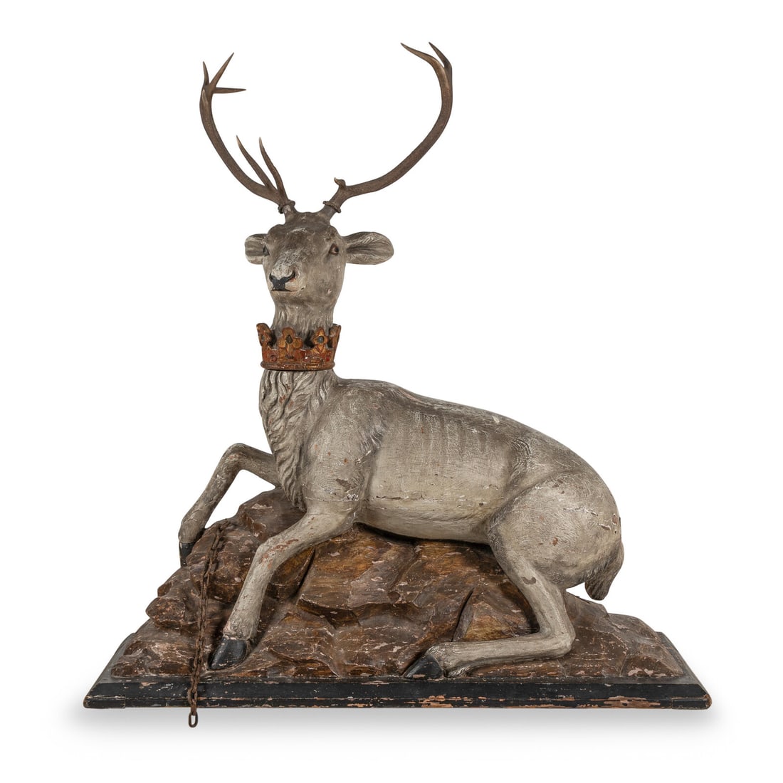 A Large Continental Carved and Polychrome Decorated Model of a Stag: A Large Continental Carved and Polychrome Decorated Model of a Stag 19th Century fitted with genuine antlers. Overall height 57 x width of base 52 x depth 16 1/2 inches. Property from a Utah Mountain