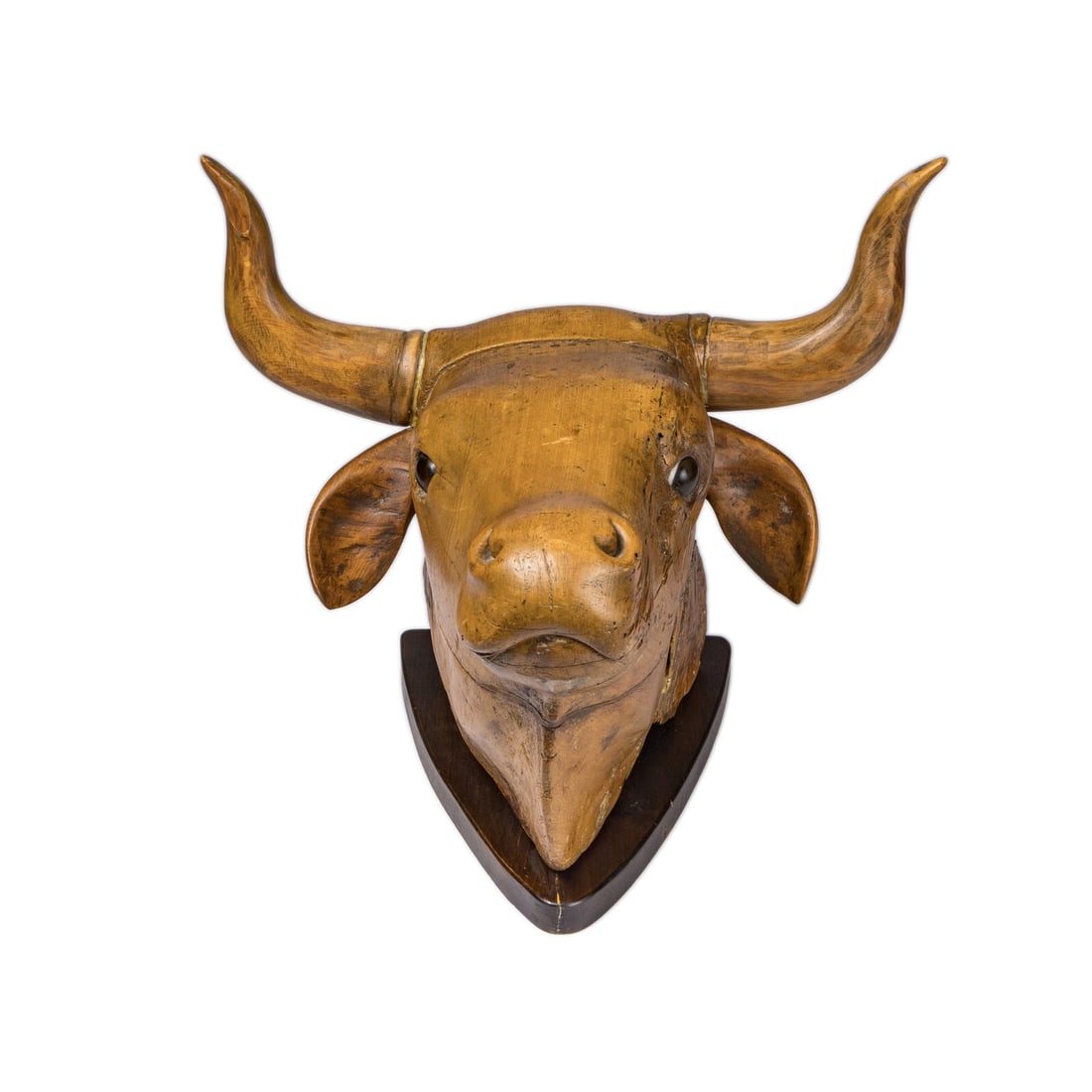 A Carved Wood Bull's Head Mount: A Carved Wood Bull's Head Mount 19th Century Height 15 x width 19 x depth 17 inches. Property from a Utah Mountain Residence