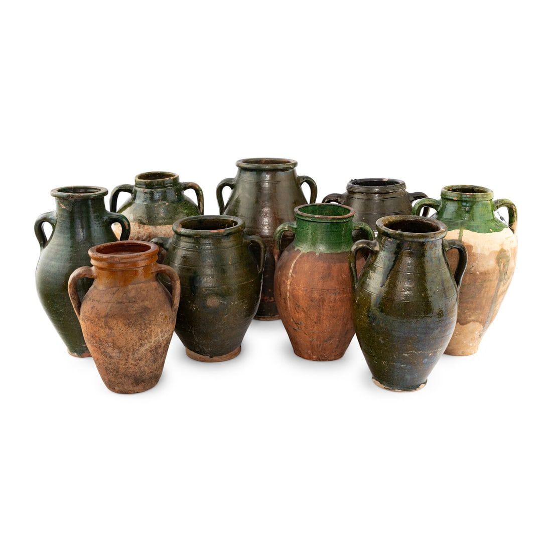 A Group of Nine Glazed Earthenware Confit Jars: A Group of Nine Glazed Earthenware Confit Jars 19th Century Height of tallest 17 1/2 x diameter 10 inches. Property from a Utah Mountain Residence This lot is located in Chicago.