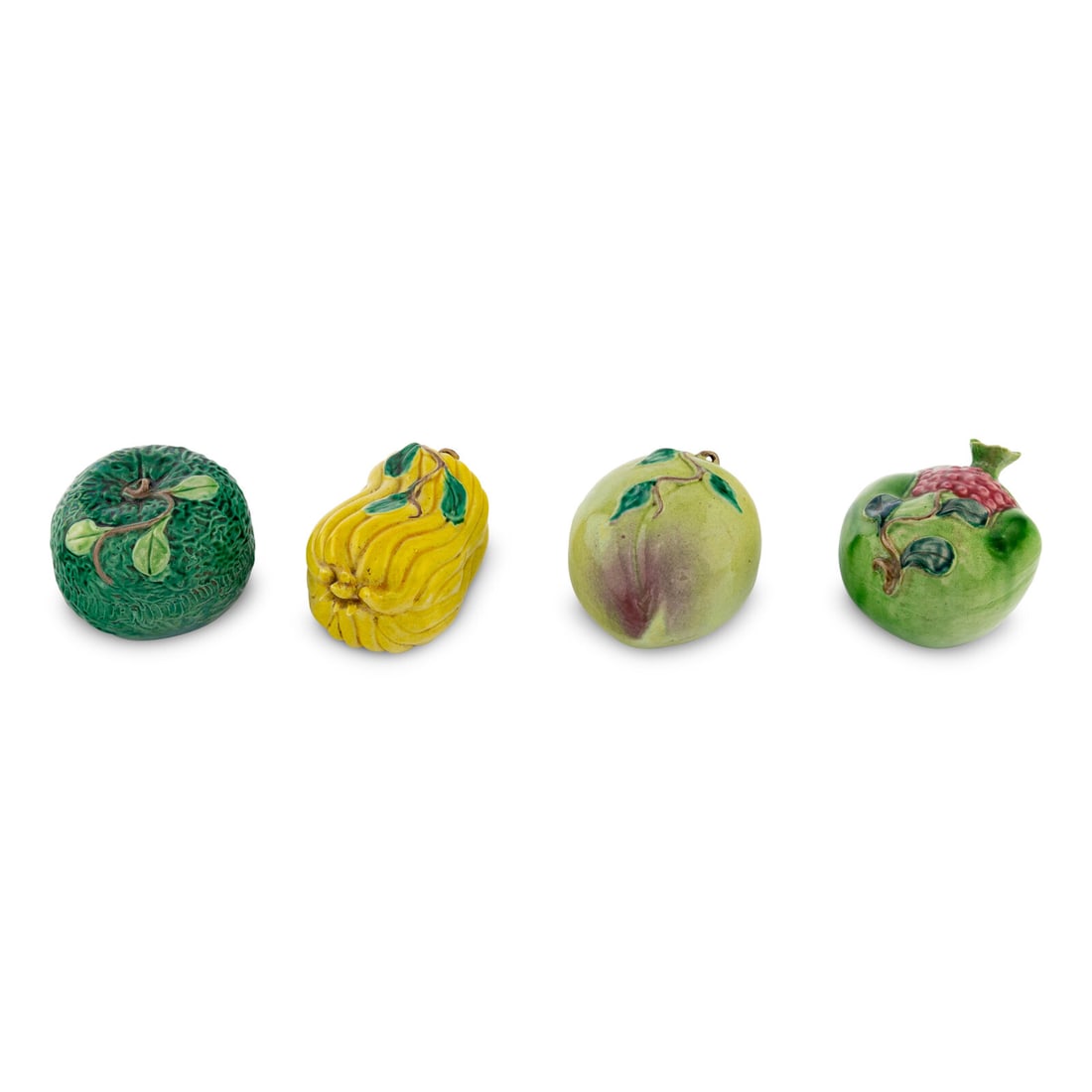 A Set of Four Chinese Glazed Terracotta Fruits: A Set of Four Chinese Glazed Terracotta Fruits Height 3 inches. Property from a Utah Mountain Residence This lot is located in Chicago.