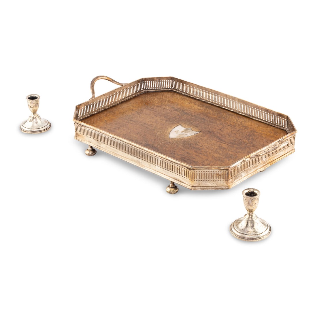 A Silver-Plate and Oak Serving Tray: A Silver-Plate and Oak Serving Tray Together with two silver weighted candlesticks Monogrammed "ALL MY HOPE IS IN GOD" Length 24 1/2 x width 14 1/4 inches. Property from a Utah Mountain Residence