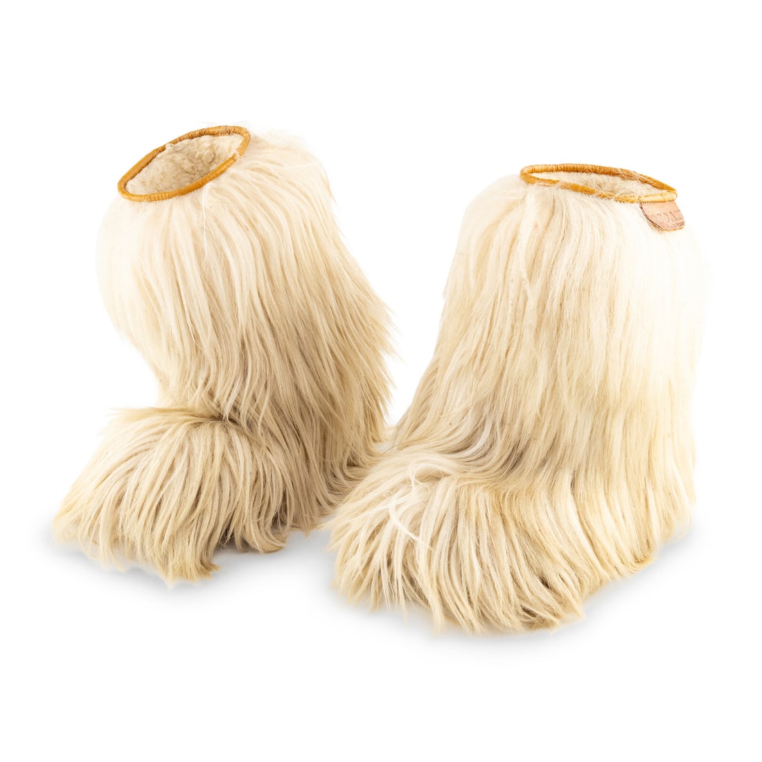 A Pair of Tibetan Goat Fur Boots: A Pair of Tibetan Goat Fur Boots Length of sole 10 inches. Property from a Utah Mountain Residence This lot is located in Chicago.