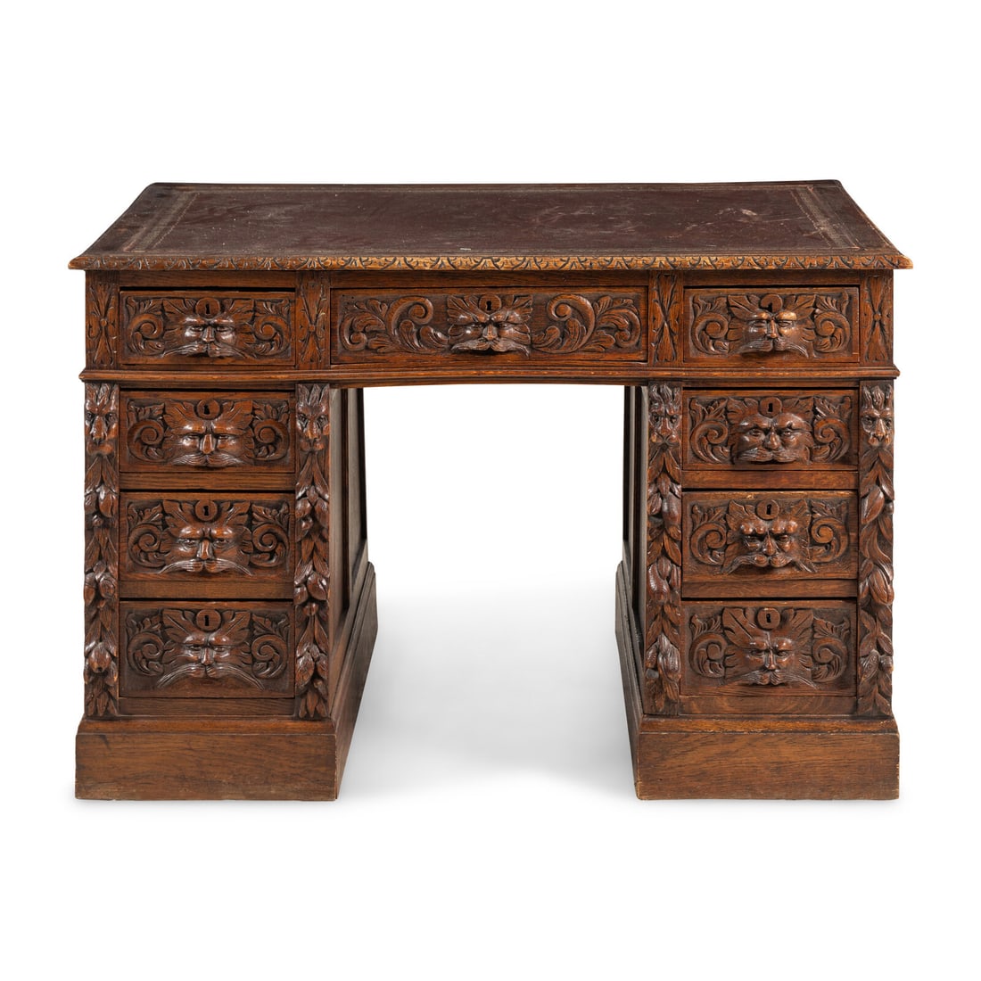 A Renaissance Revival Carved Oak Pedestal Desk: A Renaissance Revival Carved Oak Pedestal Desk Late 19th Century Height 30 1/2 x width 47 x depth 29 1/2 inches. Property from a Utah Mountain Residence This lot is located in Chicago.