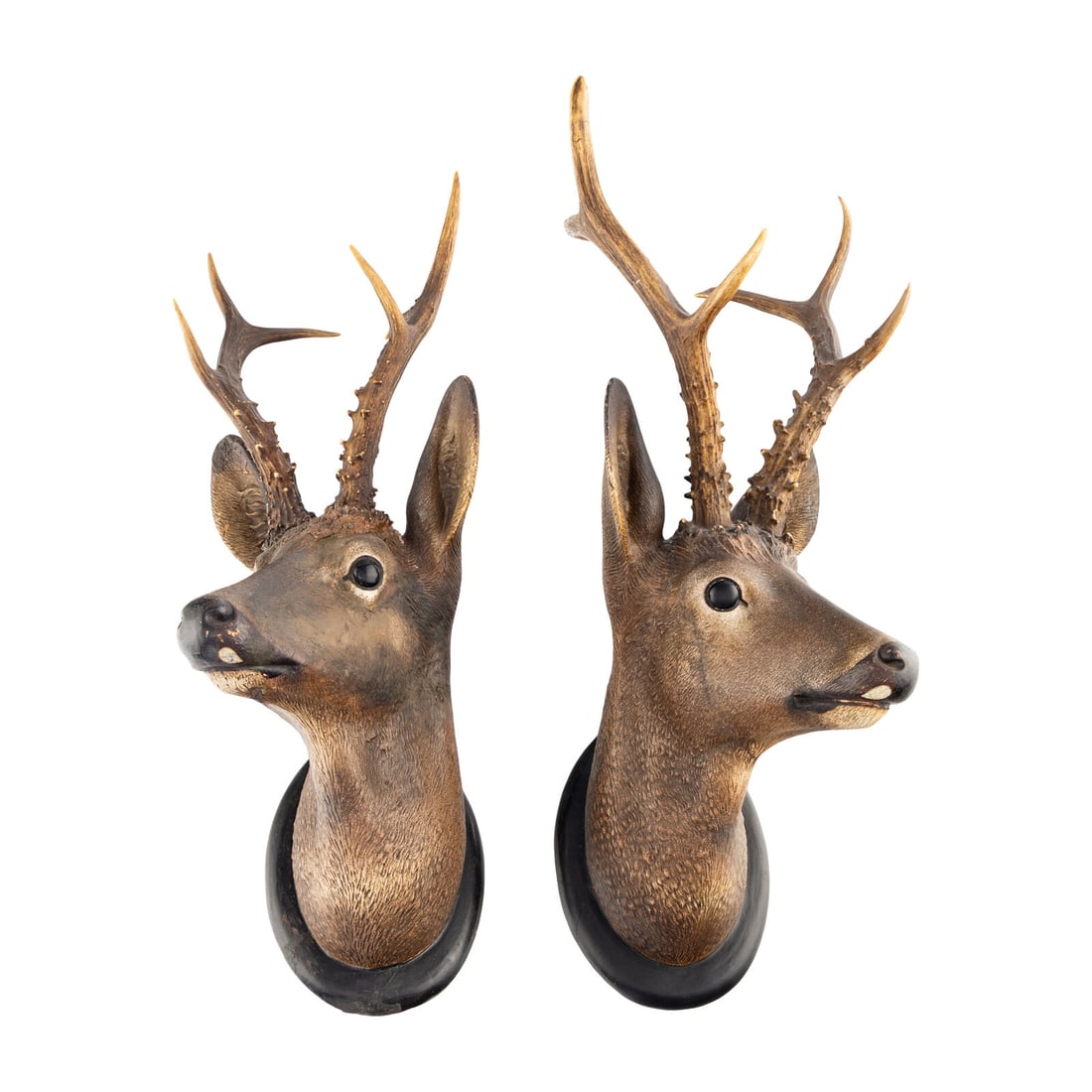 A Pair of Continental Painted Terracotta Deer Mounts: A Pair of Continental Painted Terracotta Deer Mounts 20th Century Height 23 1/4 width 8 x depth 10 inches. Property from a Utah Mountain Residence This lot is located in Chicago.