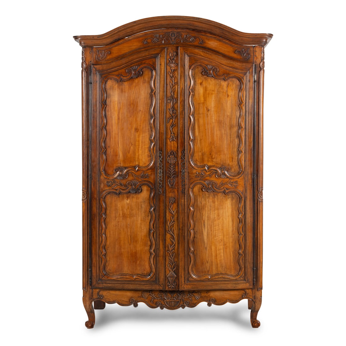 A Louis XV Provincial Walnut Armoire: A Louis XV Provincial Walnut Armoire Mid 18th Century Height 91 x width 56 1/2 x depth 22 1/2 inches. Property from a Utah Mountain Residence This lot is located in Chicago.