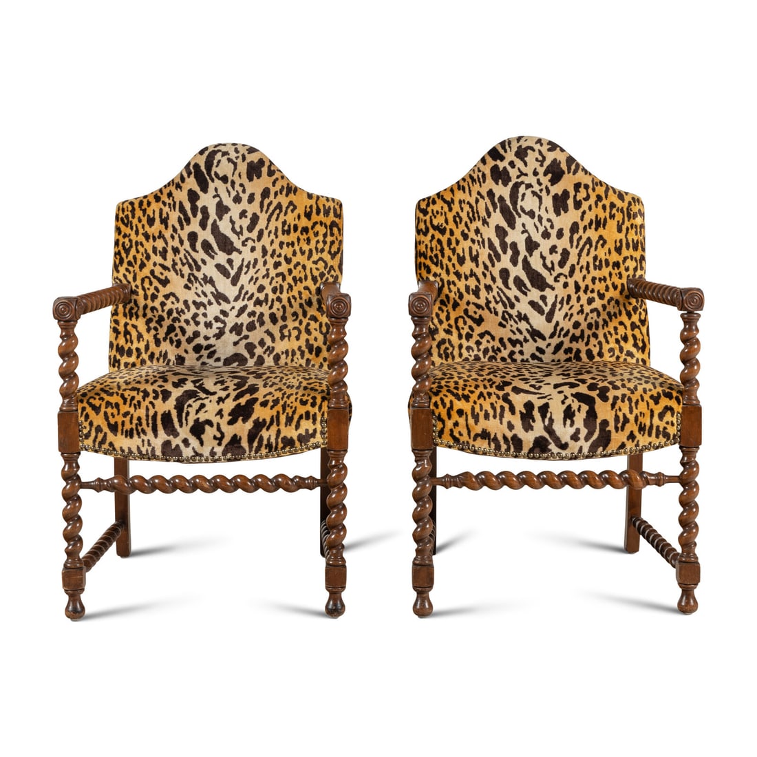 A Pair of English Turned Walnut Armchairs with Cheetah Velvet Upholstery: A Pair of English Turned Walnut Armchairs with Cheetah Velvet Upholstery 19th Century Height 39 x width 24 1/4 x depth 21 inches. Property from a Utah Mountain Residence This lot is located in