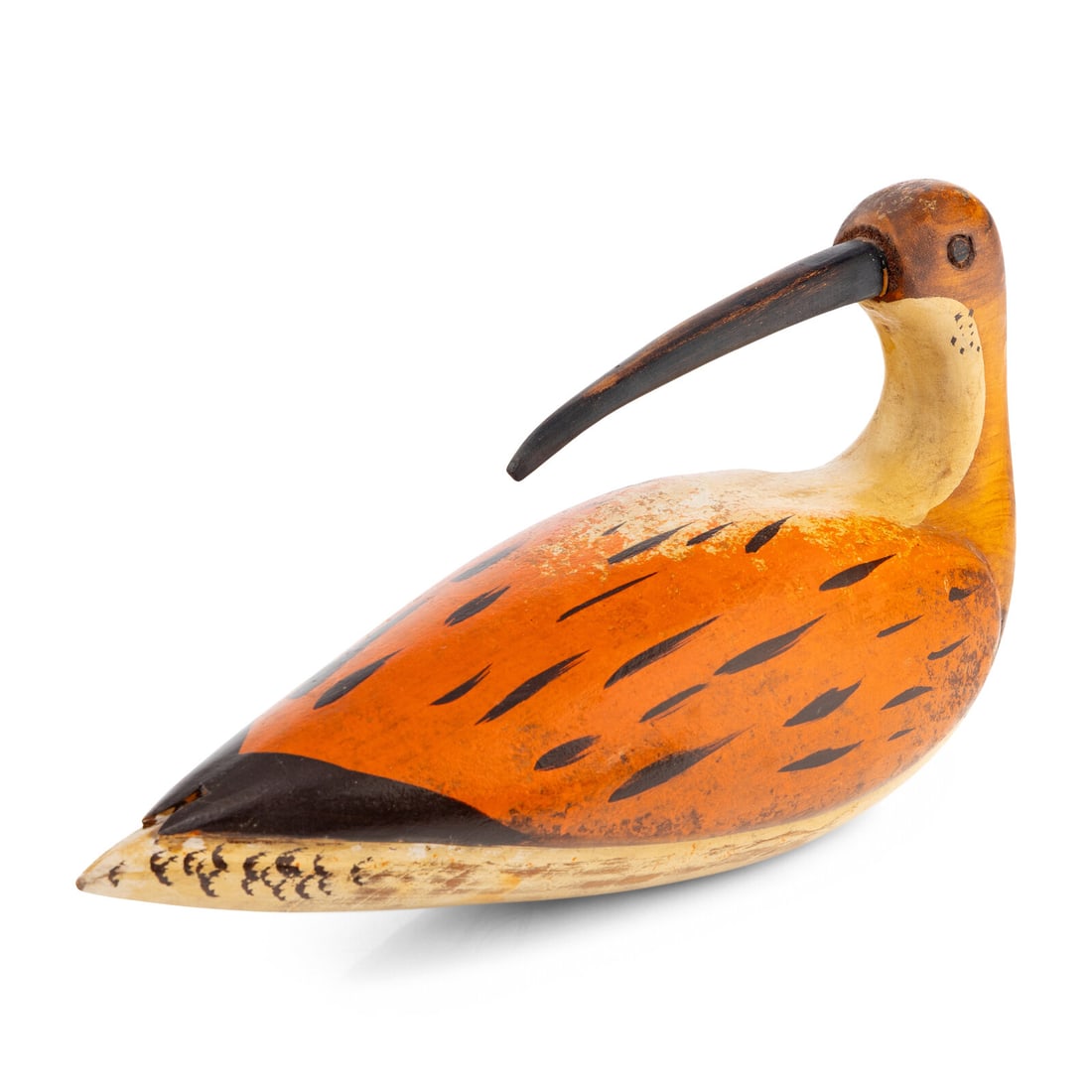 A Carved and Painted Sandpiper Bird Decoy: A Carved and Painted Sandpiper Bird Decoy Height 7 1/2 x width 4 x depth 14 inches. Property from a Utah Mountain Residence This lot is located in Chicago.