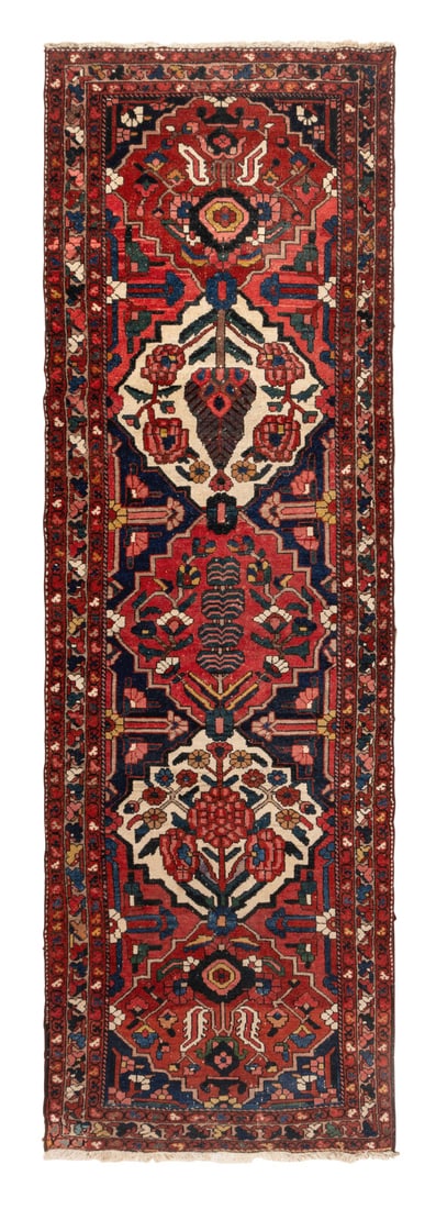 A Bakhtiari "Corridor" Rug: A Bakhtiari "Corridor" Rug Circa 1930 10 feet 9 inches x 3 feet 7 inches. Property from a Utah Mountain Residence This lot is located in Chicago.