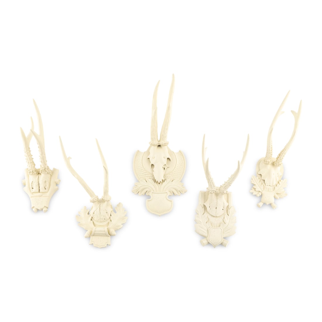A Group of White Painted Antler Mounts: A Group of White Painted Antler Mounts 20th Century Height of largest 16 x width 7 x depth 6 1/2 inches. Property from a Utah Mountain Residence This lot is located in Chicago.