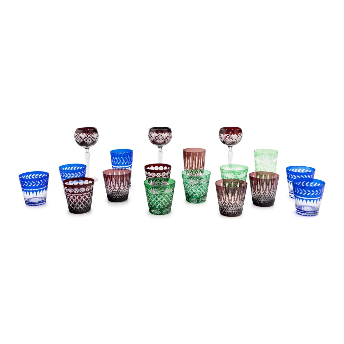 A Set of Colored Cut-to-Clear Glass Barware: A Set of Colored Cut-to-Clear Glass Barware 18 items total Height of tallest 8 1/2 inches. Property from a Utah Mountain Residence This lot is located in Chicago.