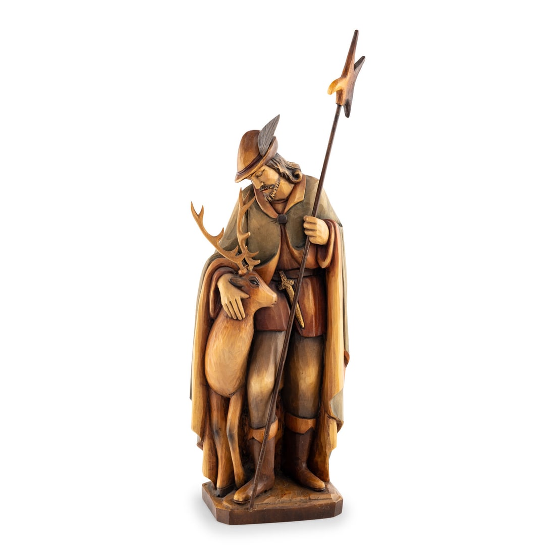 A Carved Wood Figure of a Bavarian Guard: A Carved Wood Figure of a Bavarian Guard 20th Century depicted standing with a buck. Height 25 x width 8 x depth 4 inches. Property from a Utah Mountain Residence This lot is located in Chicago.
