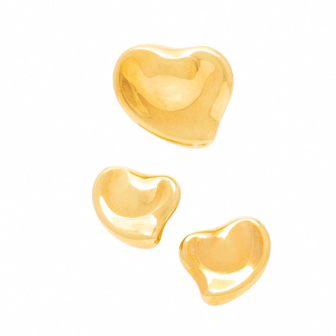Tiffany & Co., Elsa Peretti, 'Full Heart', Yellow Gold Earrings and Brooch: Tiffany & Co., Elsa Peretti, 'Full Heart', Yellow Gold Earrings and Brooch Designed as sculptural hearts. 18 karat yellow gold. Earrings: 1 1/16 inches long. Brooch: 1 3/8 x 1 1/4 inches. Stamp: TIFFA