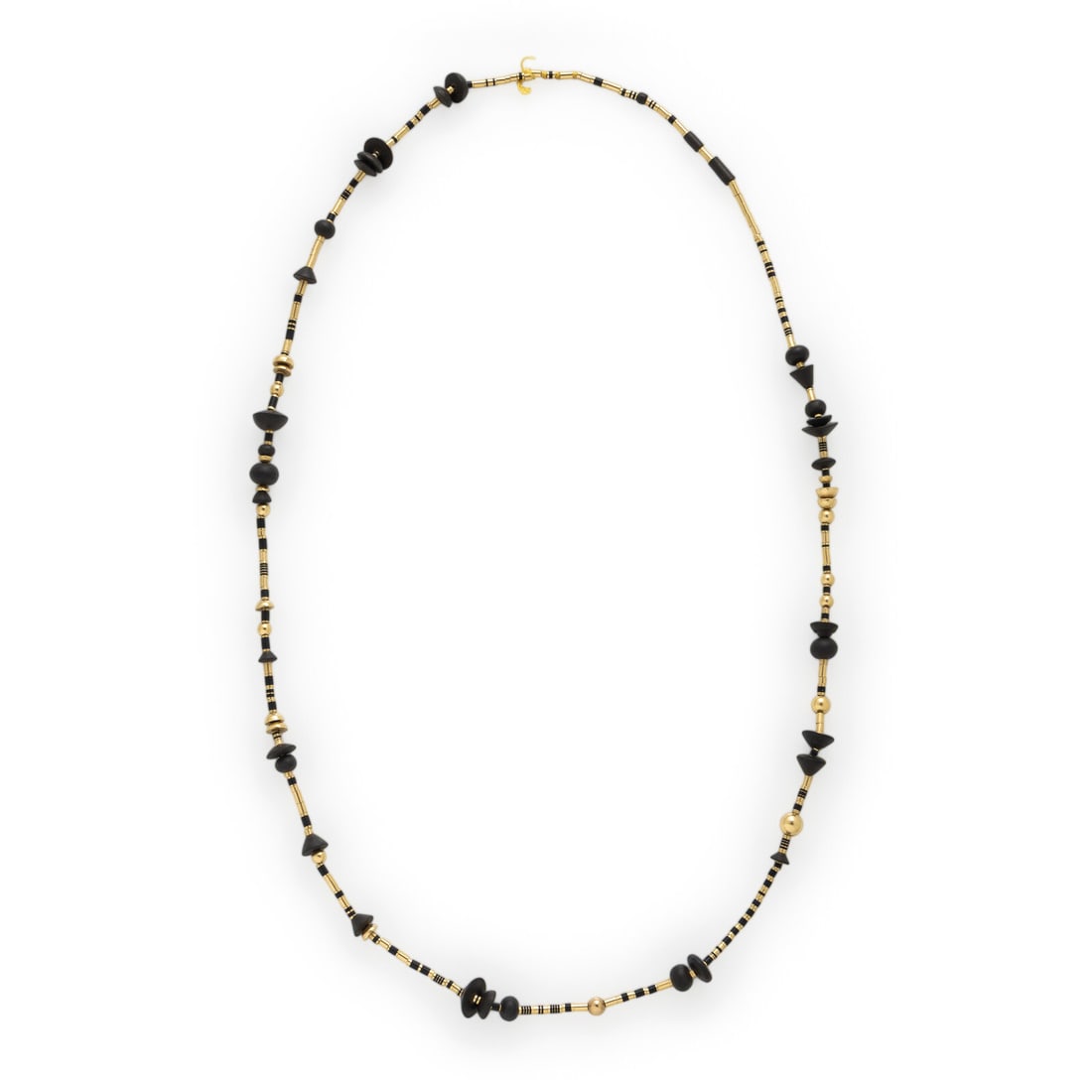 Wendy Ramshaw, Yellow Gold and Black Basalt Bead Necklace: Wendy Ramshaw, Yellow Gold and Black Basalt Bead Necklace Carved black basalt beads. Yellow gold. 35 1/2 inches long. Gross weight: 32.50 dwt. Property from a Private Collection Provenance: Acquired d