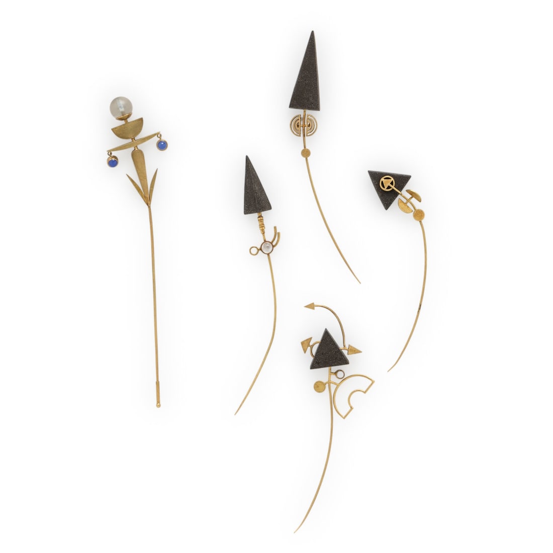 Wendy Ramshaw, Collection of Five Yellow Gold and Multigem Stick Pins: Wendy Ramshaw, Collection of Five Yellow Gold and Multigem Stick Pins One with a spherical jasperware element and round cabochon blue chrysoprase, two with carved black basalt, one with carved black b