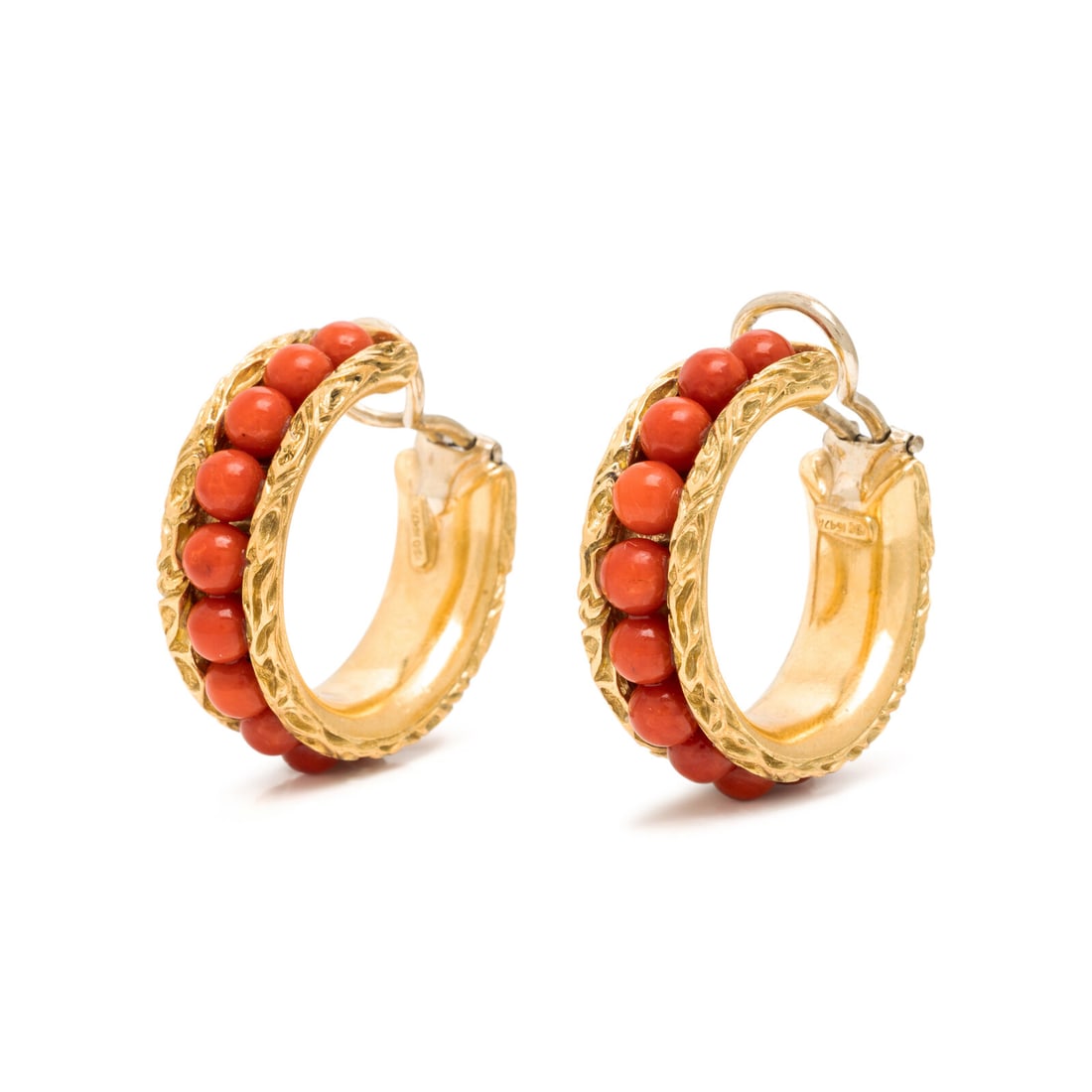 Coral and Yellow Gold Hoop Earrings: Coral and Yellow Gold Hoop Earrings Round coral beads measuring approximately 4.85 mm. 18 karat yellow gold. 1 1/4 inches long. Stamp: 750 1647A. Gross weight: 21.25 dwt.