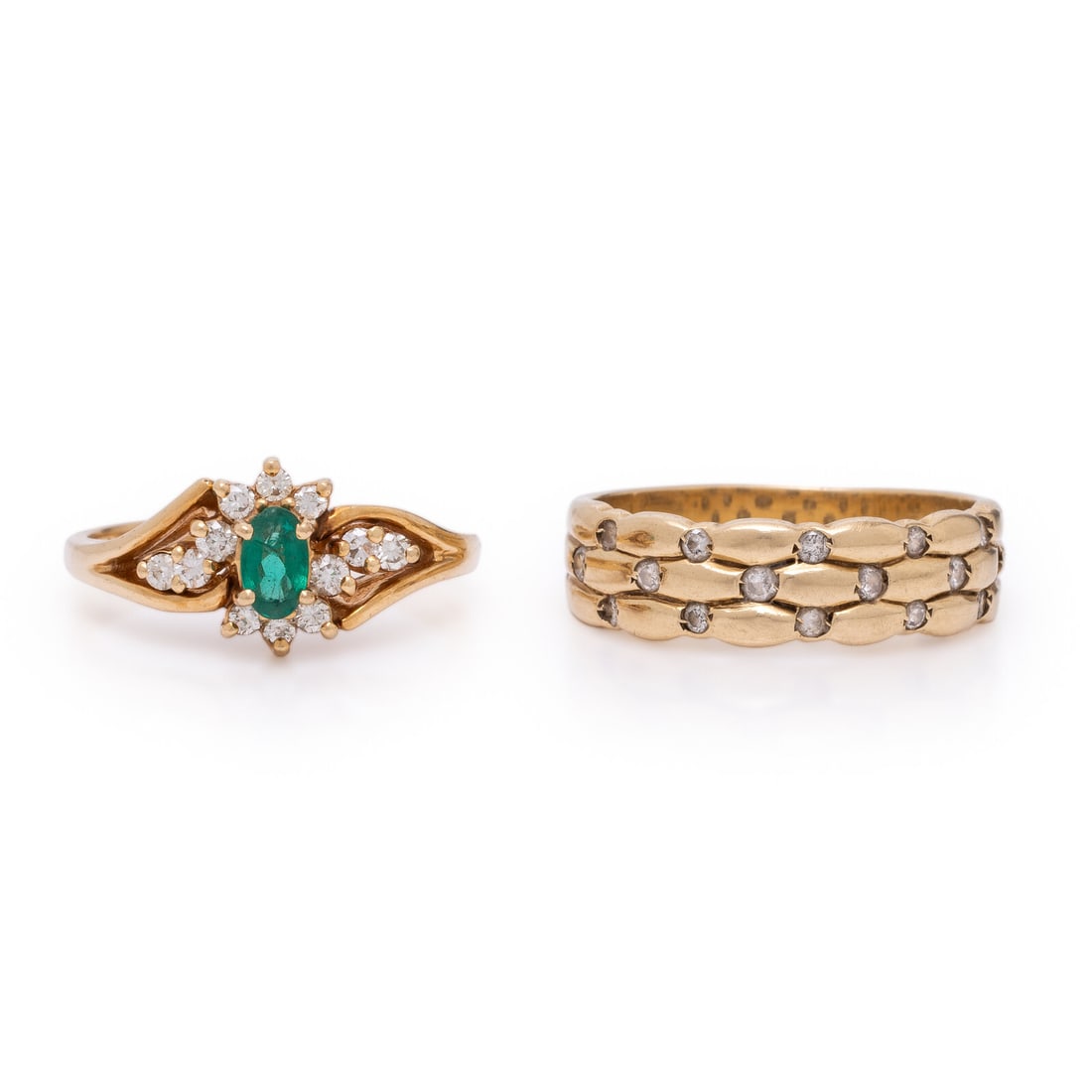 Two Yellow Gold and Gemstone Rings: Two Yellow Gold and Gemstone Rings One ring set with round brilliant cut diamonds weighing approximately 0.10 carat total and an oval emerald, and one ring set with round brilliant cut diamonds weighi