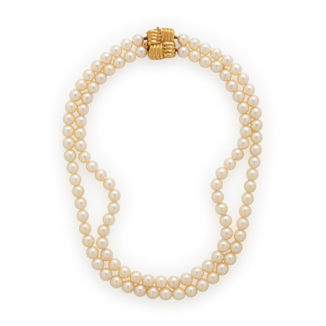 Cultured Pearl Necklace: Cultured Pearl Necklace Two strands of cultured pearls measuring approximately 7.00 - 7.20 mm. 18 karat yellow gold. 15 5/8 inches long. Stamp: BDE 750 18K. Gross weight: 42.95 dwt.