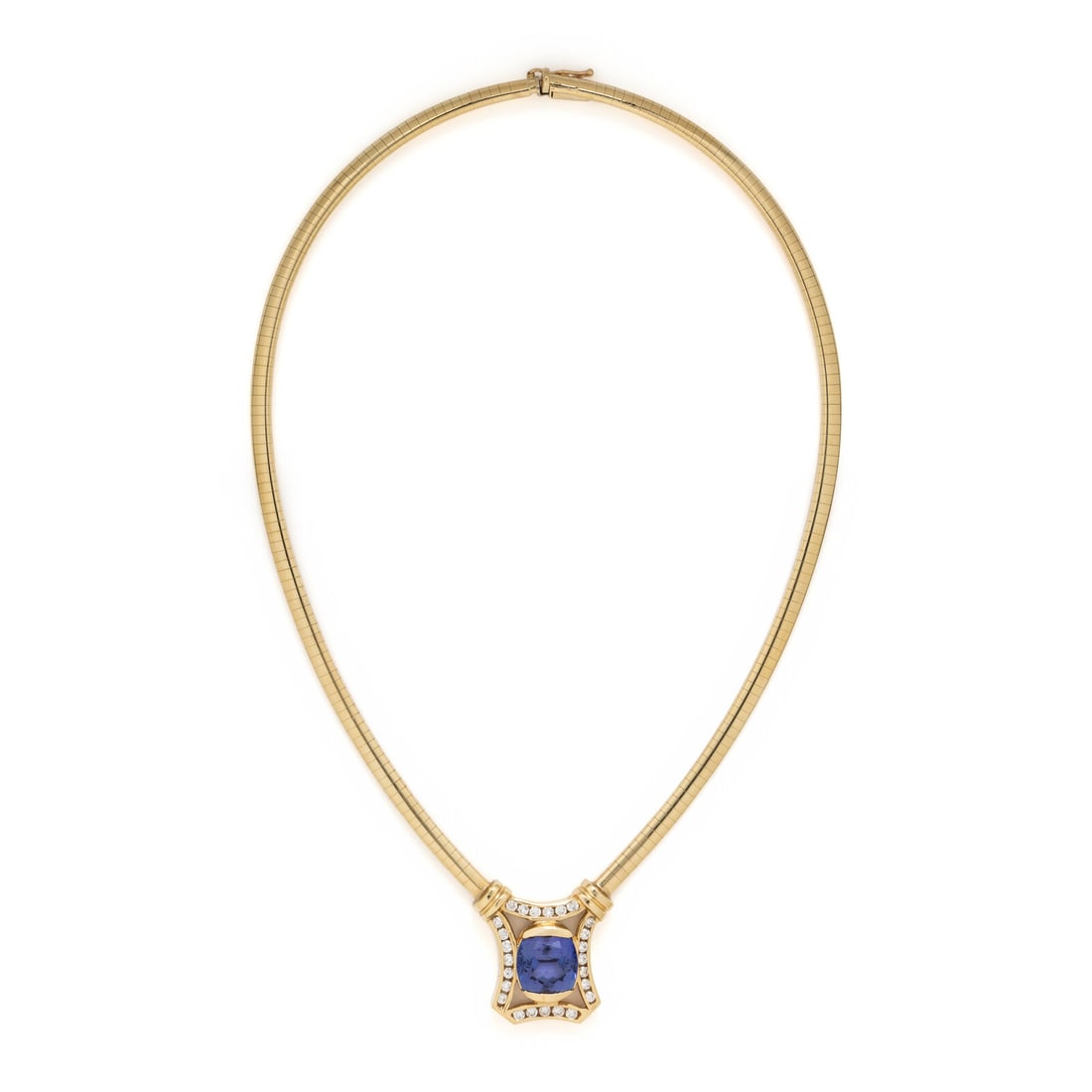 Yellow Gold, Tanzanite, and Diamond Necklace: Yellow Gold, Tanzanite, and Diamond Necklace Cushion cut tanzanite weighing approximately 7.00 carats by formula, and round diamonds weighing approximately 0.75 carat total. 14 karat yellow gold. 15 1