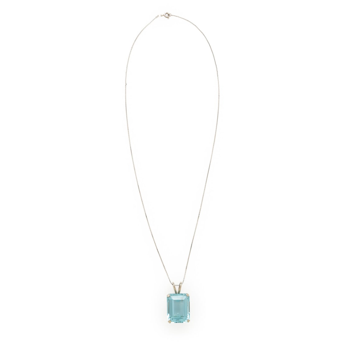 Aquamarine and White Gold Pendant Necklace: Aquamarine and White Gold Pendant Necklace Emerald cut aquamarine weighing approximately 35.40 carats by formula. 14 karat white gold. 20 inches long. Chain stamp: OR 14KT ITALY. Gross weight: 8.65 dw
