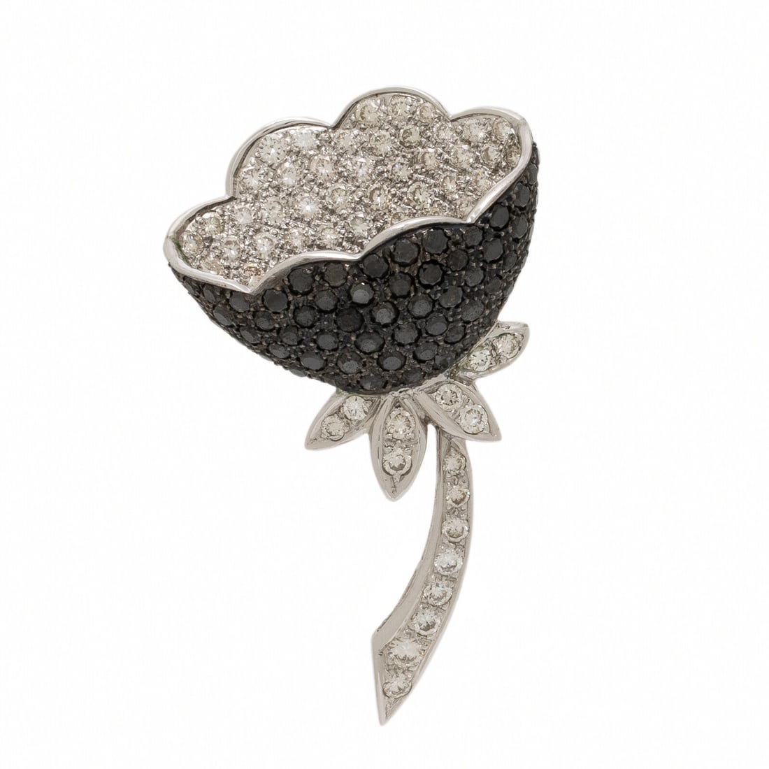 Diamond, Black Diamond, and White Gold Flower Brooch: Diamond, Black Diamond, and White Gold Flower Brooch PavÈ-set round brilliant cut diamonds weighing approximately 0.90 carat total, and pavÈ-set round black diamonds. 18 karat white and blac