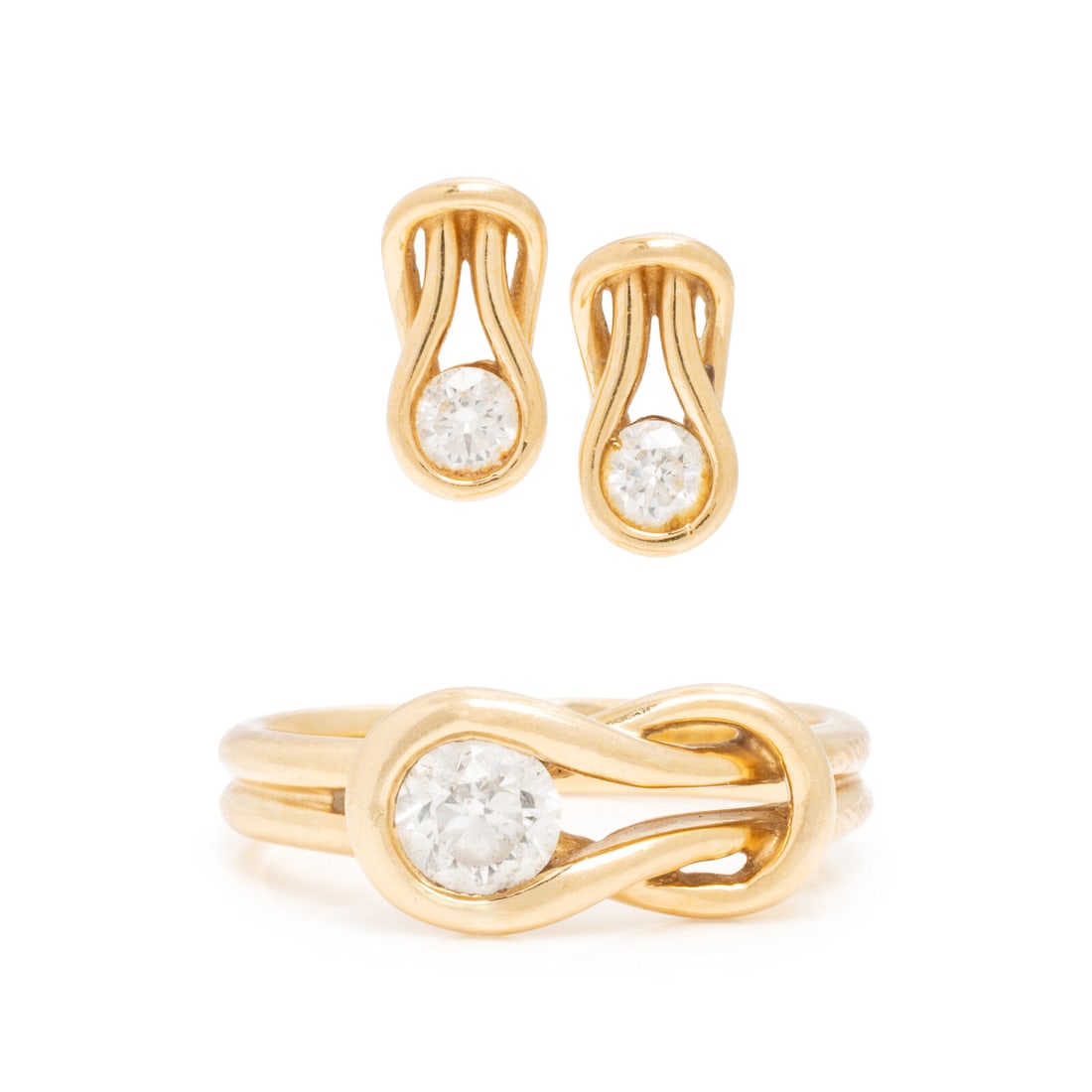 Diamond and Yellow Gold Knot Ring and Earrings: Diamond and Yellow Gold Knot Ring and Earrings The earrings set with round brilliant cut diamonds weighing approximately 0.25 carat total, and the ring set with a transitional cut diamond weighing app