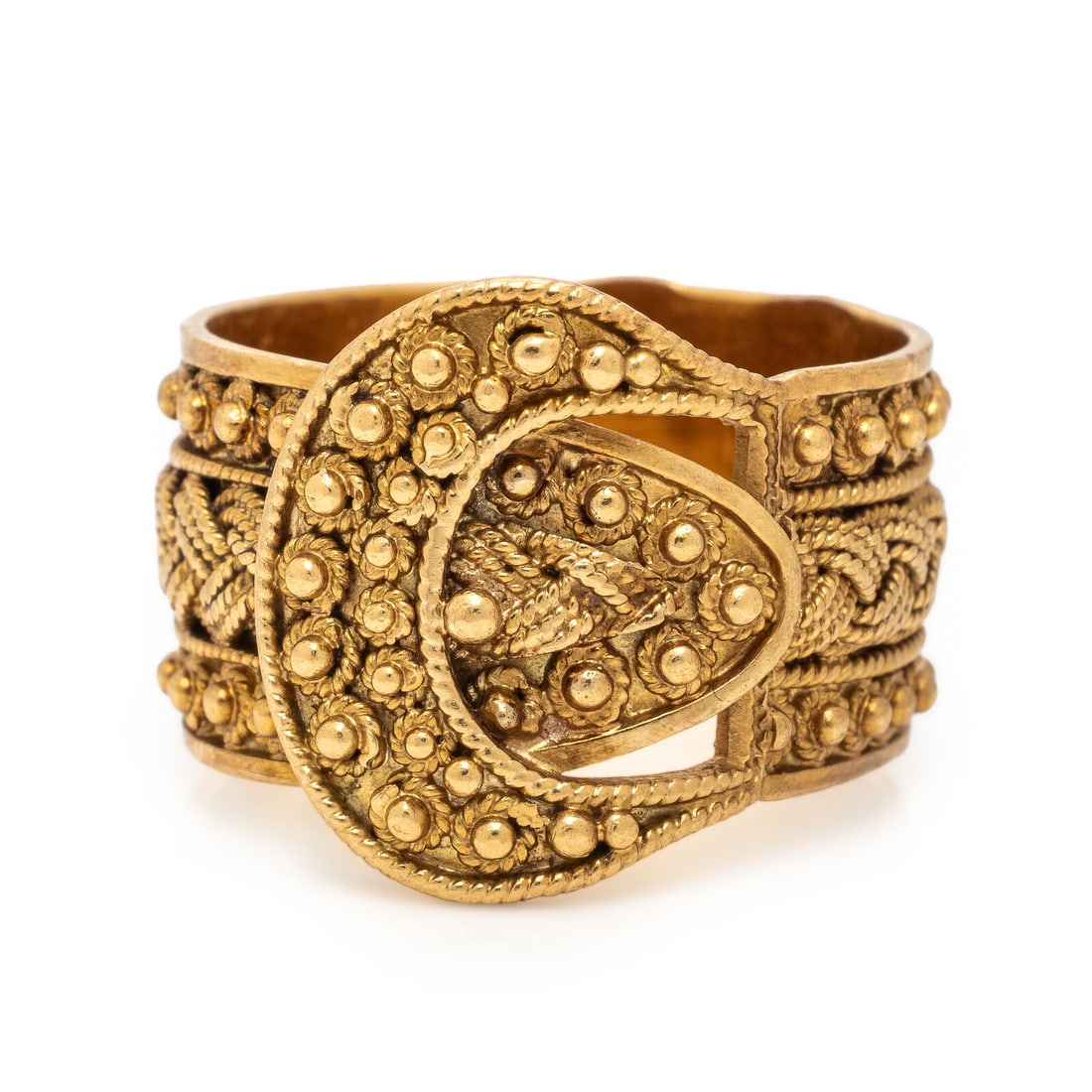 Yellow Gold Buckle Ring: Yellow Gold Buckle Ring Yellow gold. Ring size 7 1/4. Gross weight: 5.35 dwt.