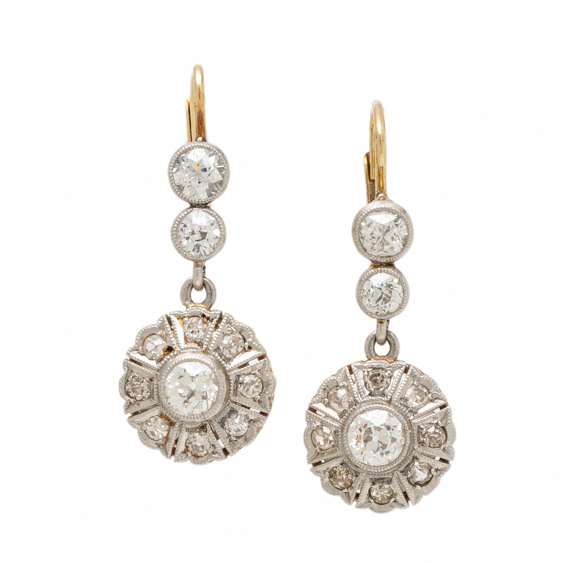 Antique, Platinum-Topped Gold and Diamond Earrings: Antique, Platinum-Topped Gold and Diamond Earrings Old European and single cut diamonds weighing approximately 1.15 carats total. Platinum-topped gold. 1 1/8 inches long. Gross weight: 2.60 dwt.