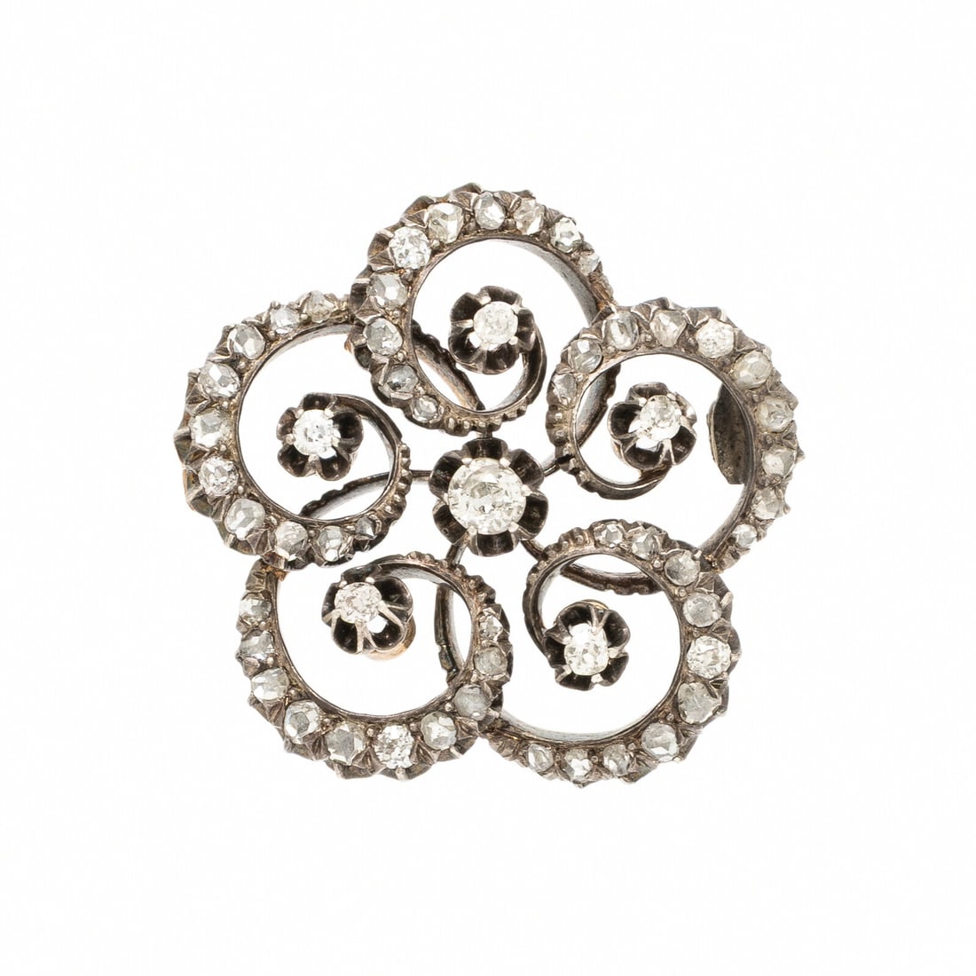Antique, Diamond and Silver-Topped Gold Flower Brooch: Antique, Diamond and Silver-Topped Gold Flower Brooch Old European cut diamonds weighing approximately 0.45 carat total, and rose cut diamonds. Silver-topped gold. 1 1/4 inches wide. Gross weight: 8.6