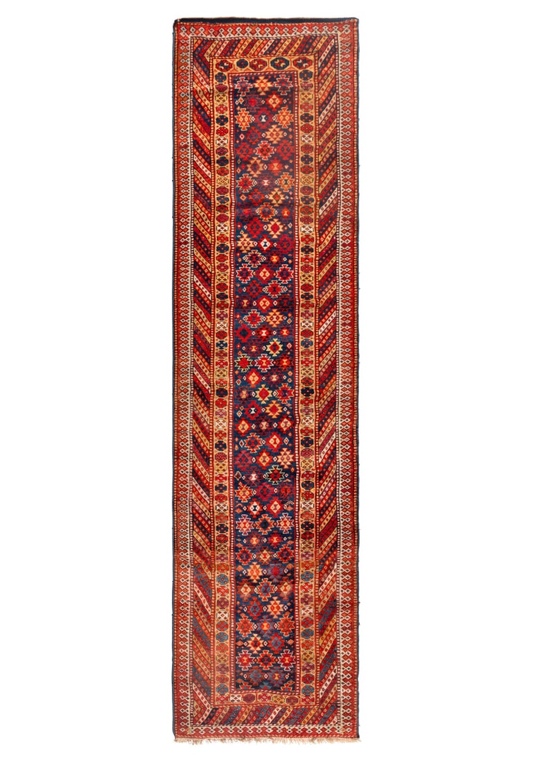 A Caucasian Runner: A Caucasian Runner 19th Century 13 feet 5 inches x 2 feet 6 inches. Property from the Estate of Constance D. and George F. Heiden, Omaha, Nebraska This lot is located in Chicago. Provenance: Harooni O