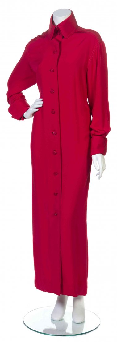 A Galanos Red Crêpe Shirt Dress,: A Galanos Red Crêpe Shirt Dress, long cuffed sleeves, with a shirt collar and buttons to the center front. Labeled: Galanos. Property from the Estate of Betsy Pickering Kaiser